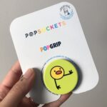 Photo of a Rolling Bird PopSockets PopGrip in its original packaging.